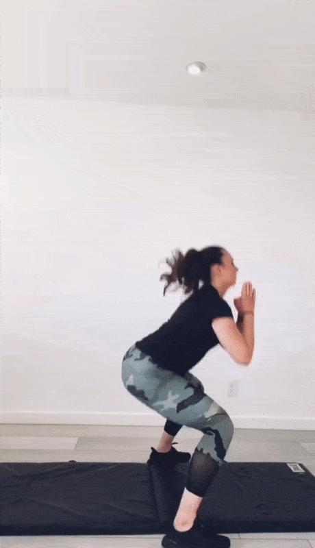 Fitness trainer doing home workout