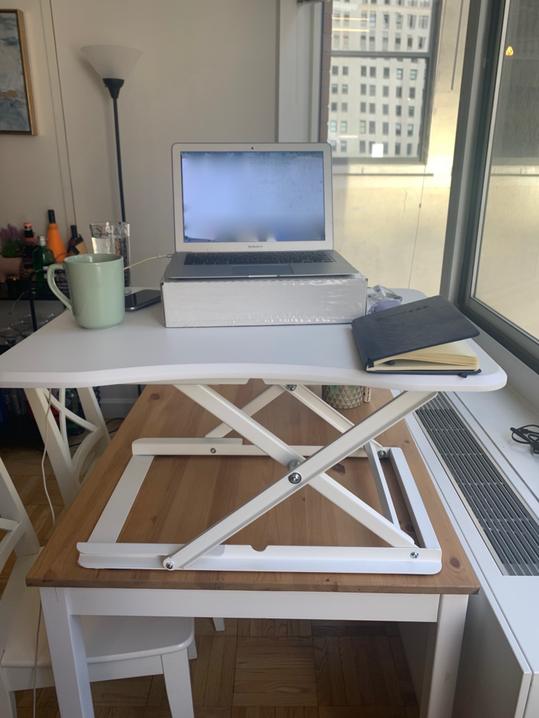 Standing desk with a laptop